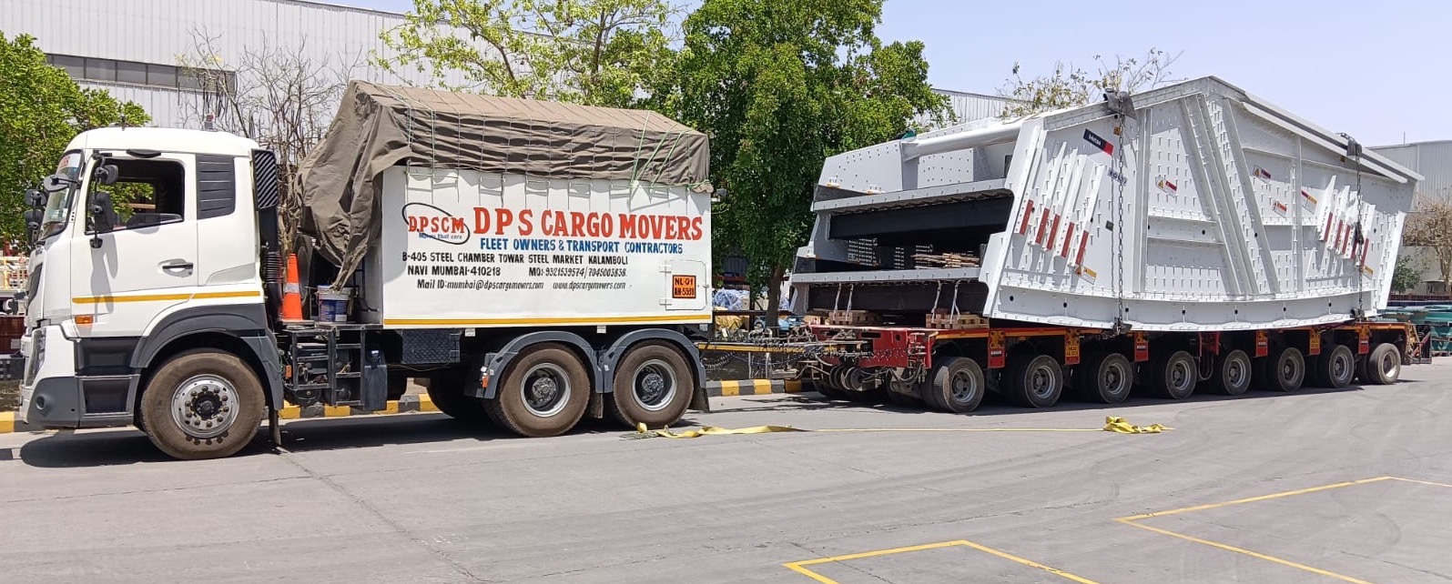 Heavy haul truck transporting machinery